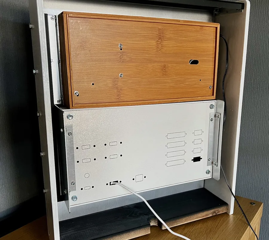 Click to view full size - View from the back – I still need to get the panel mount connectors for the PiDP-11 but for now all I need is power and able to connect over WiFi. The space at the bottom is left for power supplies and the cutout in the base is there as I'm tempted to wall mount this so will run a cable conduit down from there.